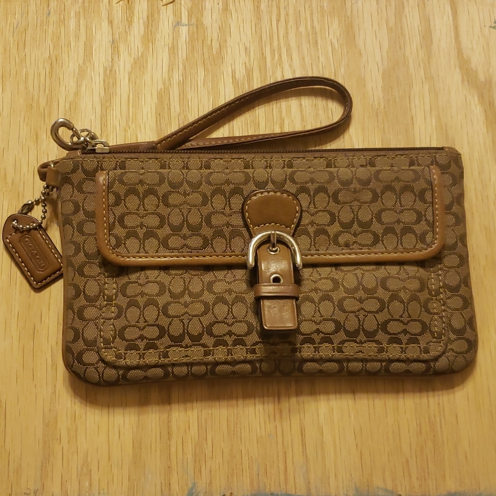 Brown signature C Coach wristlet